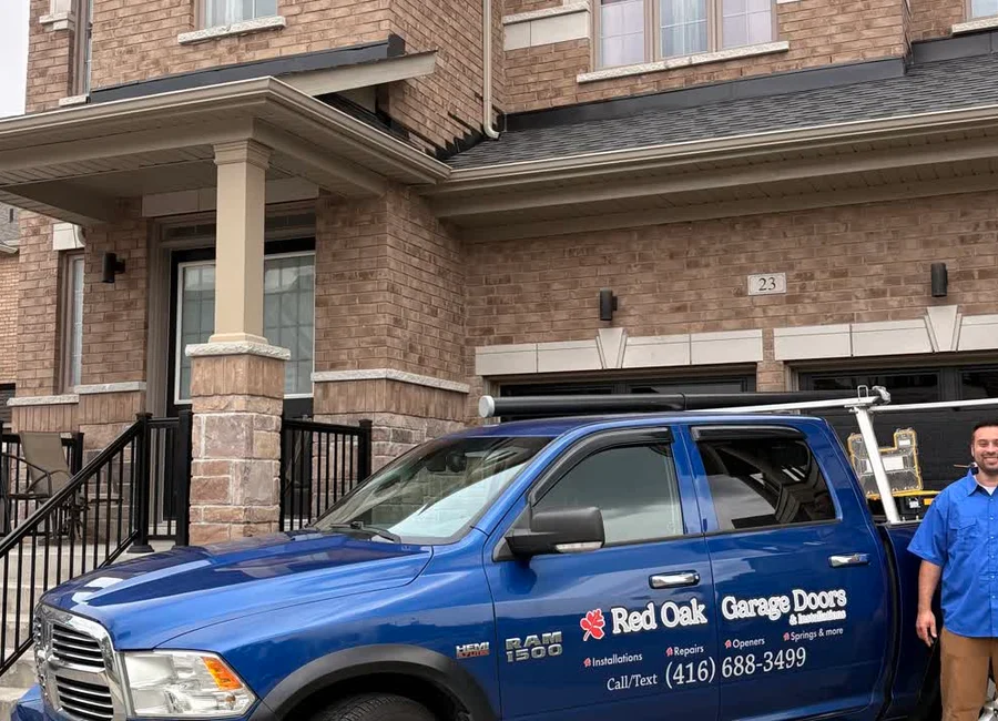 RedOak Garage Doors service truck at a home