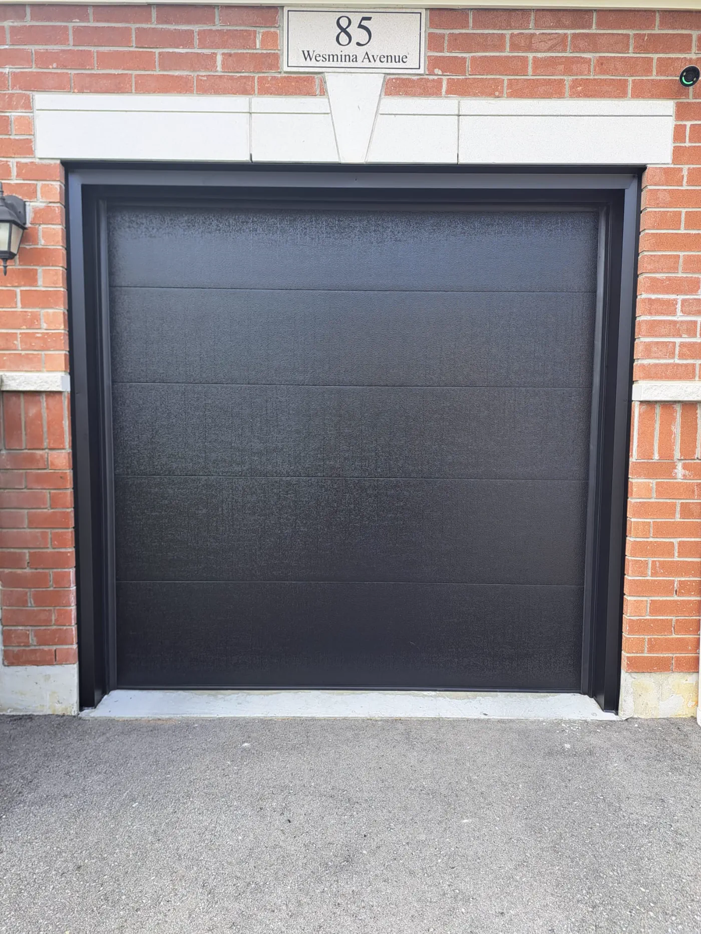 Second RedOak field photo showing garage-door detail near newmarket